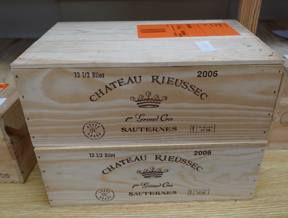 Two sealed cases of twelve half bottles (twenty-four bottles) of 2006 Chateau Rieussec, Sauternes, in OWC's, purchased en primeur from the wine society. Condition - good